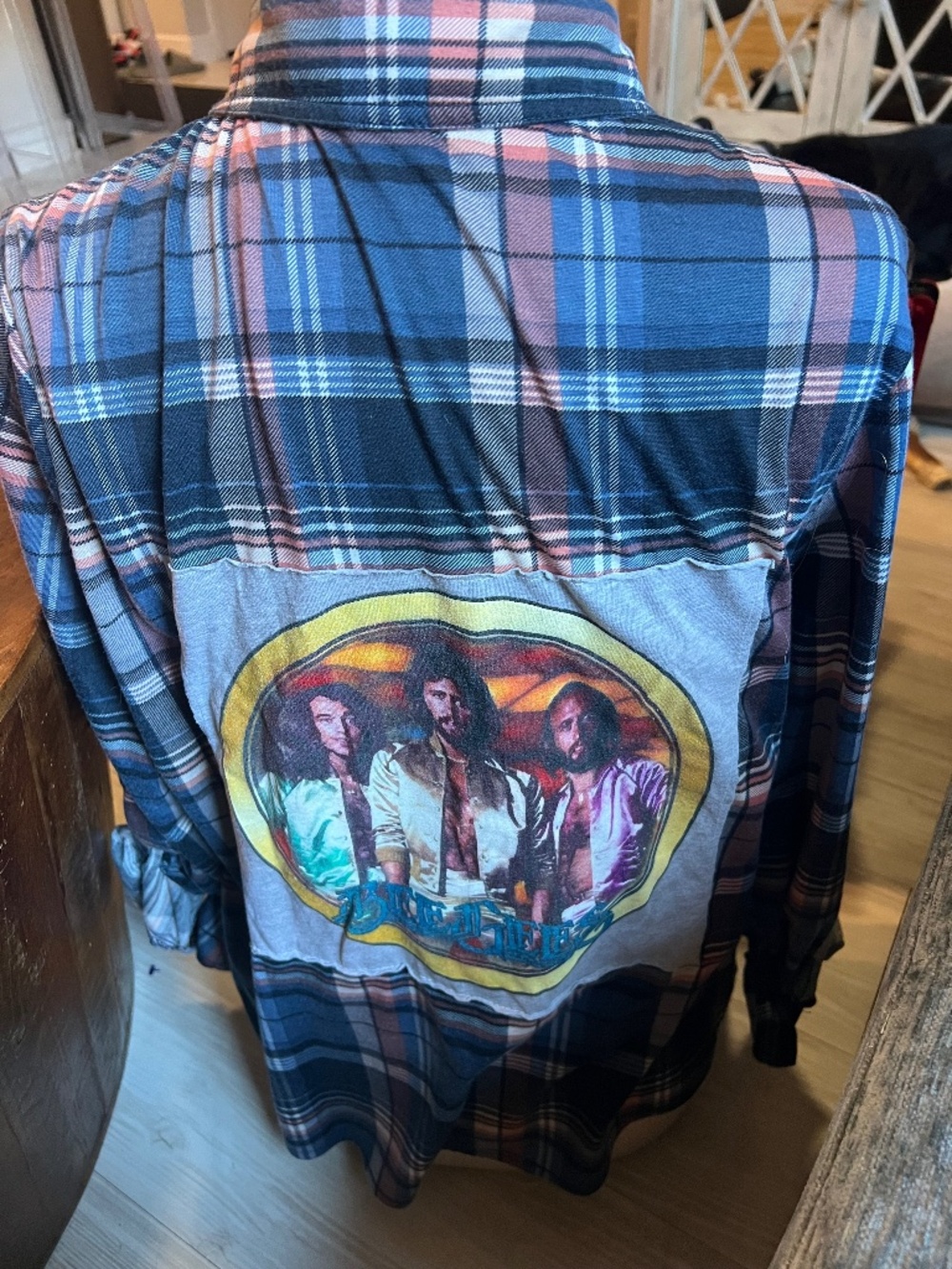 XL flannel button down with Bee Gees patch on the back